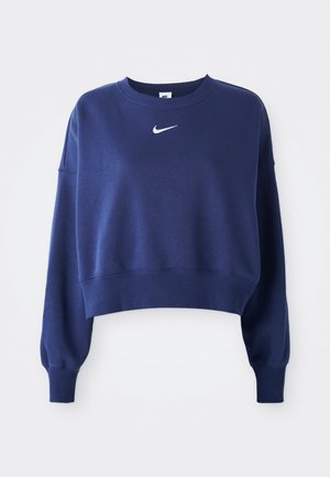 Mornarije plavi skraćeni dukserica od mekog materijala, s okruglim izrezom, dugim rukavima i bijelim Nike logotipom na grudima.