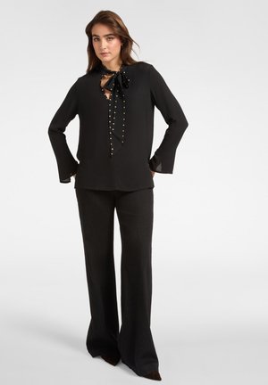 CON FUSCIACCA E BORCHIE PIATTE - Blusa - nero