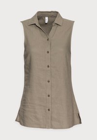 Camicia senza maniche, con colletto in un morbido tessuto beige, caratterizzata da bottoni frontali e spacchetti laterali per facilitare i movimenti. Realizzata in tessuto leggero.