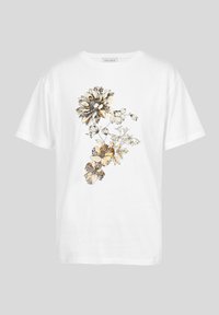 Hvit bomulls T-skjorte med blomster- og sommerfuglmønster i svart og gult, med avslappet passform og rund hals.