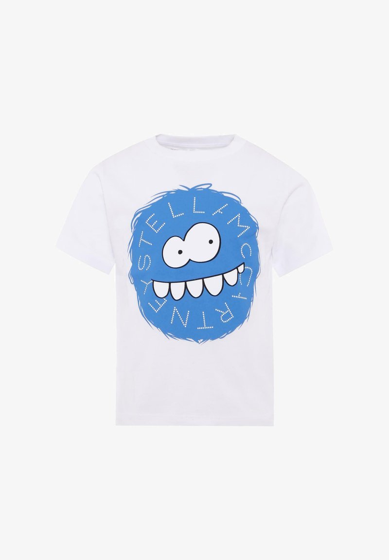 T-shirt in cotone bianco con una grande faccia di un personaggio dei cartoni animati blu, con occhi e bocca sovradimensionati, circondata da testo disposto in un motivo circolare.