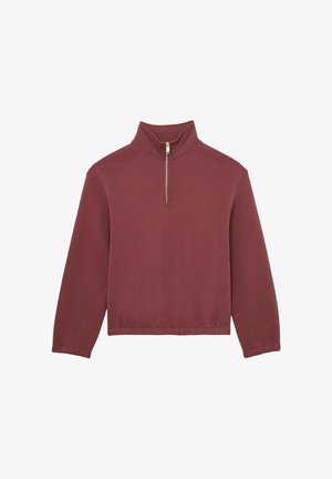 Ilgas rankovėmis, švelniai violetinės spalvos puloveris su ketvirtiniu, auksinės spalvos užtrauktuku ir stačia apykakle, su elastingu apdailos apvadu ir rankogaliais.