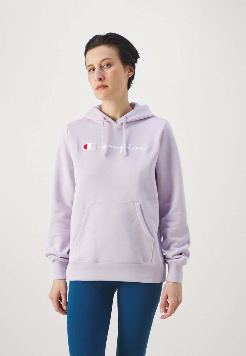 Felpa leggera viola con cappuccio regolabile, tasca frontale e logo ricamato. Tessuto morbido, polsini a costine e dettaglio del logo distintivo sulla manica.
