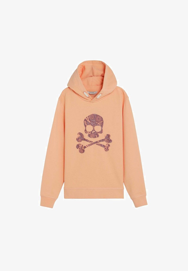 Sweat à capuche couleur pêche avec un design de tête de mort et os croisés violets ornés de motifs floraux sur le devant, présenté sur un fond blanc.