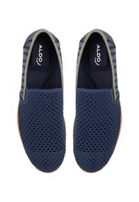 Navy slip-on shoes with a breathable mesh upper, almond-shaped toe, cushioned navy interior, and a light brown rubber outsole.
