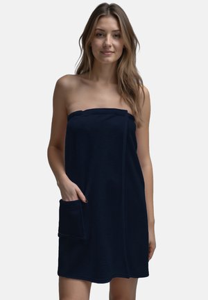 Wrap in spugna di colore navy realizzato in tessuto morbido, caratterizzato da un design senza spalline, tasca frontale e una texture liscia. Adatto per l'uso dopo la doccia.