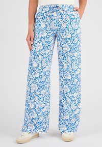 Blauwe en witte bloemenpatroon wijde broek gemaakt van lichtgewicht stof, met een elastische tailleband en zijzakken.