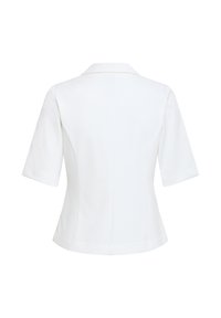 Blazer blanc sur mesure à manches courtes avec une coupe structurée et un col, présenté de dos sur un fond uni.