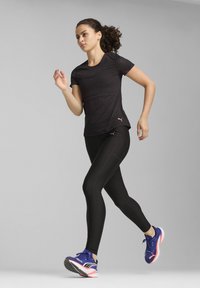 Puma RUN ULTRAFORM HW FL TIGHT W - Leggings - black