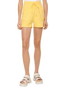Geel katoenen badstof shorts met een elastische tailleband en koord. Voorzien van twee voorzakken en een ontspannen pasvorm. Gladde textuur.