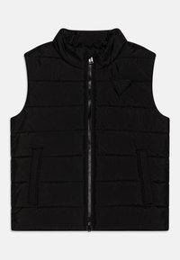 Svart puffervest med høy krage, glidelås foran og sidelommer; har horisontal søm og et logo-patch på brystet.