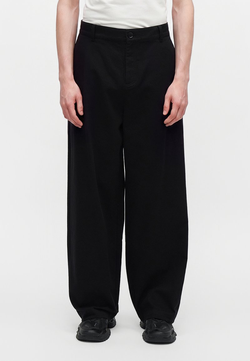 Han Kjøbenhavn WIDE LEG - Pantalon classique - black