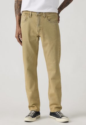 502® TAPER - Kavbojke na korenček - running dry