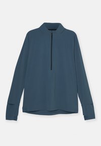 Donkerblauwe trui met lange mouwen, voorzien van een ritssluiting bij de kraag, raglanmouwen en insnijdingen bij de manchetten. Soepele, lichte stof.