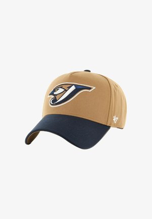 Tan baseball cap with a navy bill and embroidered bird logo in blue and brown. Features structured crown and curved visor.