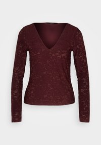 Bordeauxfarbenes Langarmoberteil mit tiefem V-Ausschnitt, aus floralem Spitzenmaterial gefertigt, mit taillierter Passform und strukturiertem Oberflächen.