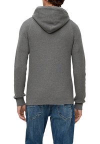 Gray ribbed hooded sweater with a textured surface, fitted cuffs, and a relaxed silhouette, paired with blue jeans.