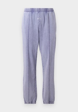Light purple sweatpants with an elastic waistband, featuring visible stitching lines and a tapered leg design. Smooth texture, casual fit.