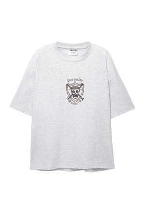 Szara bawełniana koszulka z grafiką czaszki z krzyżującymi się kośćmi w tarczy, oznaczona napisem "ONE PIECE". Krótkie rękawy, luźny krój.