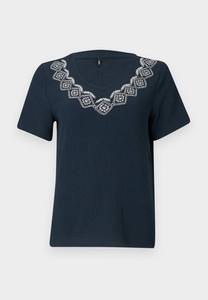 Navy blue t-shirt with short sleeves and a V-neck. Features white embroidered geometric pattern around the neckline. Textured fabric.