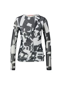 Langarmtop van doorschijnende stof, met een zwart-wit abstract patroon, draperingen en een ronde halslijn.