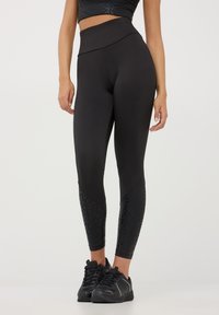 Terranova CON DETTAGLI MACULATI LUCCICANTI - Leggings - nero
