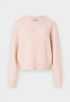 Pulover tricotat de culoare roz deschis, cu un model texturat, de tip v-neck și manșete și tiv cu nervuri. Design scurt, cu o croială relaxată.