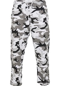 Graue und weiße Camouflage-Sweatpants mit einem elastischen Bund und Kordelzug sowie einer entspannten Passform. Der Stoff ist weich und glatt.