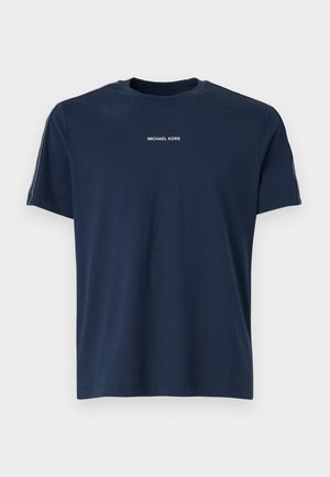 Navy blue crew-neck t-shirt made from cotton, featuring short sleeves. "MICHAEL KORS" logo positioned centrally in white text.