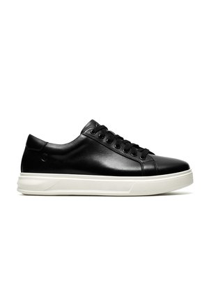 Black leather sneaker with a low-top design, flat white sole, rounded toe, and six eyelets for laces. Smooth texture with minimal detailing.