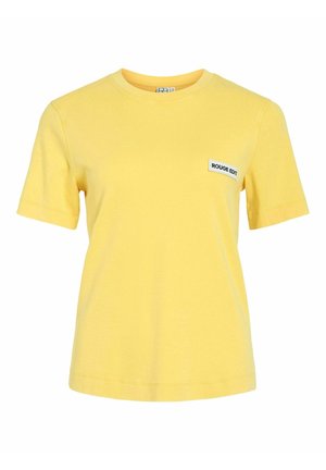 Gul kortærmet bomulds-T-shirt med rund hals og lille hvid lap på brystet med teksten "ROUGE EDIT".