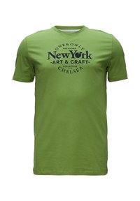 Zelené bavlněné tričko s krátkými rukávy, se zaobleným námořnickým potiskem uvádějícím "New York Art & Craft Collective Chelsea." Hladký povrch.
