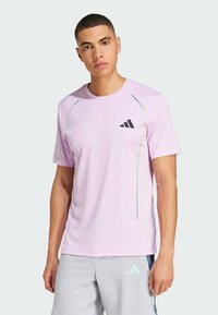 adidas Performance TECH APPAREL - Sportovní tričko - bliss lilac