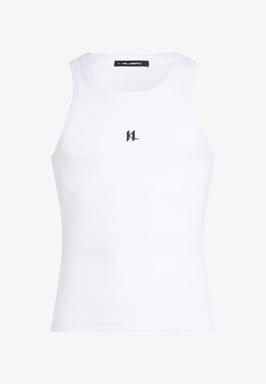 Top in cotone a coste bianco con scollatura rotonda e forma aderente. Presenta un piccolo logo nero "KL" al centro anteriore. Texture liscia.