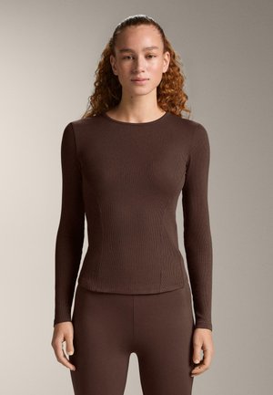 - Bluzka z długim rękawem