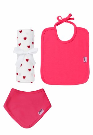 Rolled white baby blanket with red hearts, pink bib with neck ties, and matching pink triangular bandana bib.