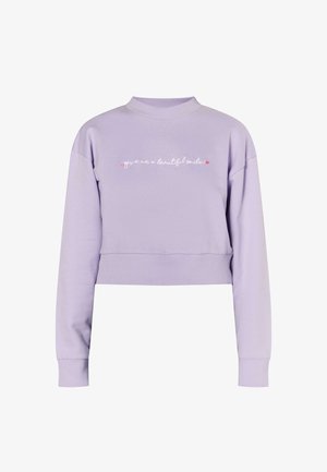 Sweatshirt lilas court avec col rond, ornée d'un texte brodé rose "donne-moi un beau sourire" sur le devant. Tissu doux, manches longues.