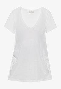 Balta V veida T-kreklu ar īsām piedurknēm, izgatavots no mīkstas auduma. Iezīmējas ar kroku sānu detaļām un brīvu piegriezumu. Etiķete: Anna Field.