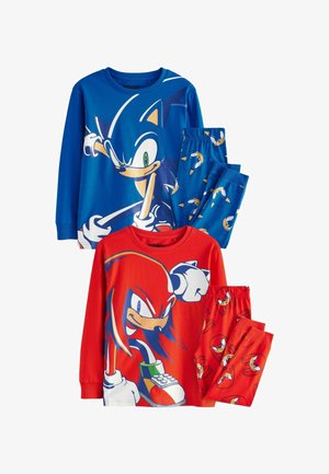 Ensemble de pyjama sur le thème de Sonic comprenant un haut à manches longues bleu avec un motif et un pantalon rouge. En coton doux, couleurs vives, graphismes de personnages et taille élastique.
