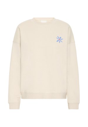 Sweatshirt beige clair à col rond en tissu doux. Présente un motif floral bleu sur la poitrine gauche ainsi que des poignets et un ourlet côtelés.