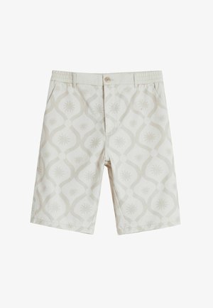 Šviesiai bežės šortai, pagaminti iš tekstūruoto audinio, turi subtilų spiralių ir saulės spindulių raštą. Su mygtuku ir elastine juosta.