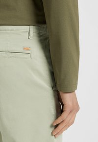 BOSS CHINO - Chino - open green thirty