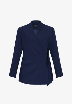 Tmavě modrý dlouhý rukáv zavinovací kabátek s bočním zavázáním a mírně véčkovým výstřihem, střih na míru.