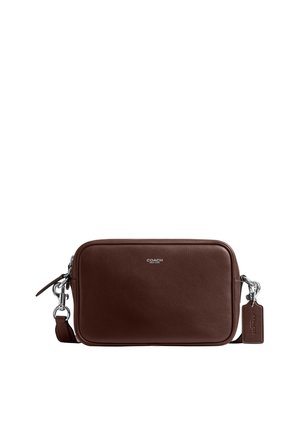 Rectangular dark brown leather crossbody bag with silver hardware, zipper closure, Coach logo, and detachable strap with leather tag.