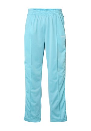 Lyseblå afslappede bukser med elastik i taljen, sidelommer og diskrete lodrette syninger ned ad forbenene.