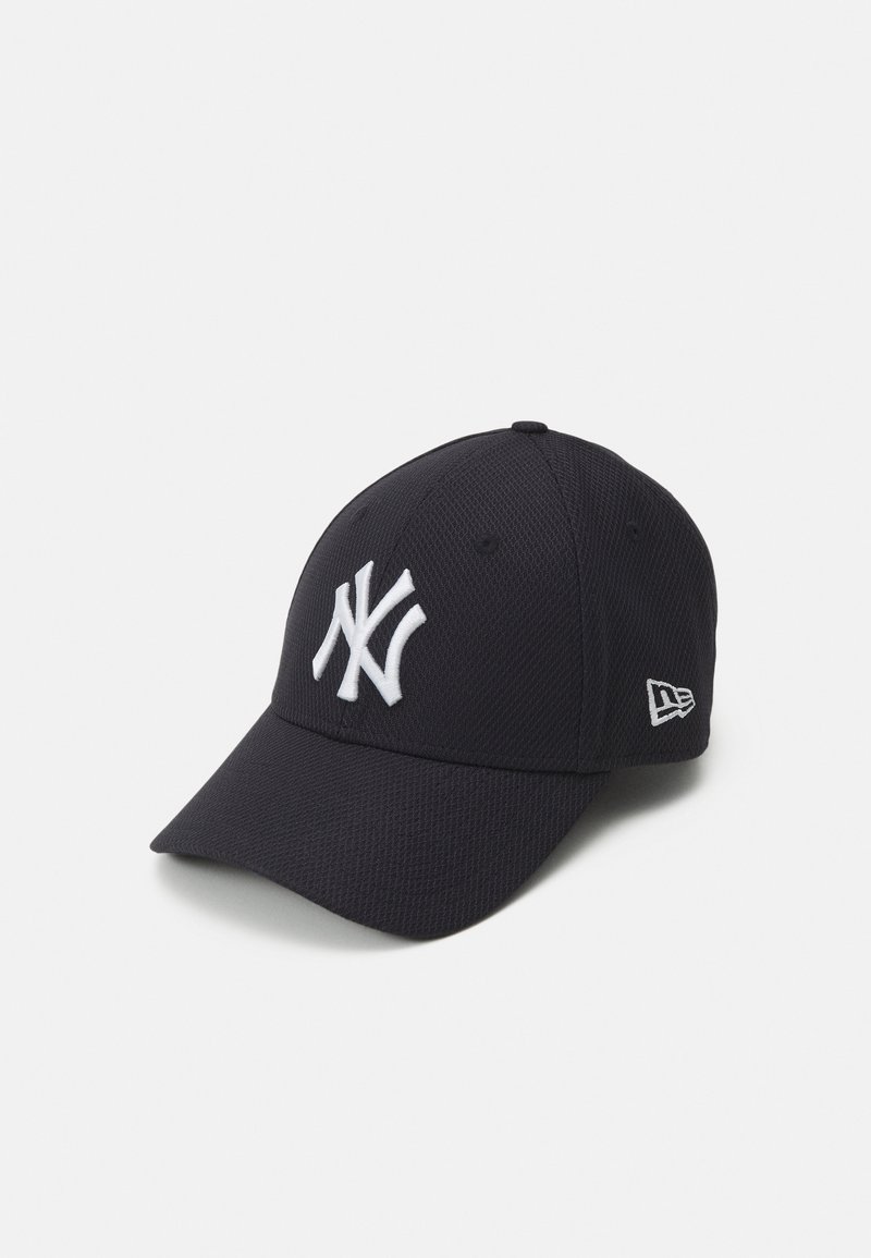 Black cap made of mesh fabric, featuring a large white embroidered NY logo on the front, with a curved brim and side stitching detail.