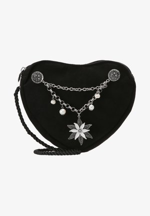 Black heart-shaped bag made of soft material, featuring silver chain accents, pearl beads, and a decorative flower pendant. Zipper closure and braided strap.