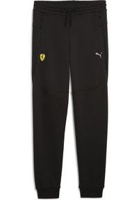 Czarne spodnie sportowe wykonane z miękkiego materiału, z zasuwanymi bocznymi kieszeniami, elastyczną talią oraz logo Ferrari i Pumy.
