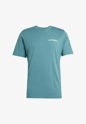 Maglietta in cotone azzurro chiaro con maniche corte, colletto tondo e logo TERREX bianco sul petto. Tessuto liscio, design semplice.