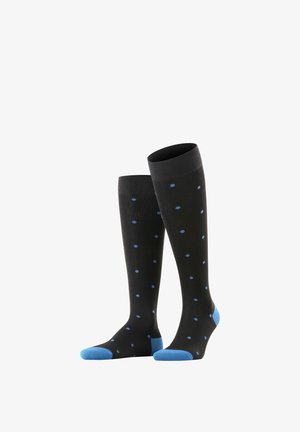 Schwarze kniehohe Socken mit blauen Polka-Dots und hellblauen Zehenakzenten. Glatte Textur und dehnbarer Stoff für hohen Tragekomfort.